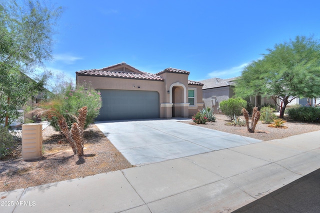 36467 W Pampoloma Ave, Maricopa, AZ 85138 - mediterranean / spanish house with a garage, driveway, a tile roof, and stucco siding