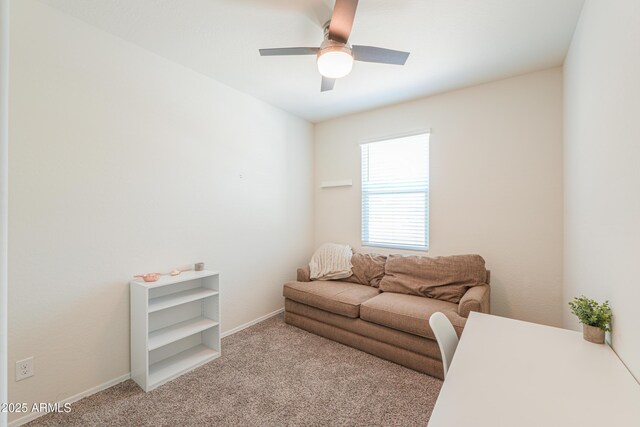 36467 W Pampoloma Ave, Maricopa, AZ 85138 - carpeted living area with a ceiling fan and baseboards
