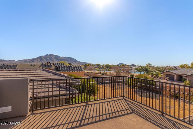 balcony featuring a mountain view