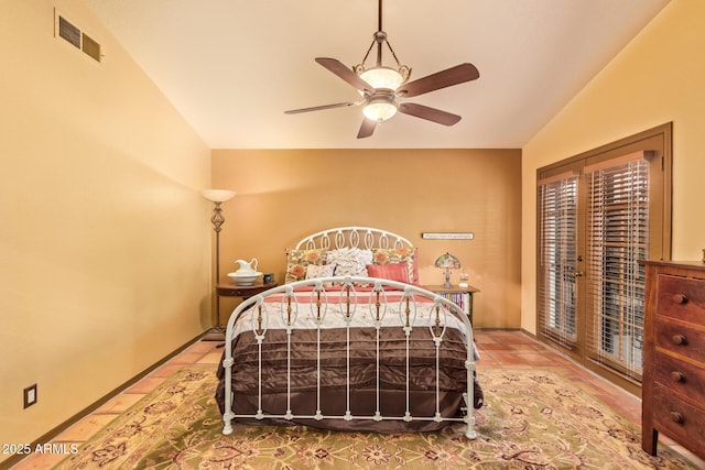 bedroom featuring visible vents, access to exterior, baseboards, ceiling fan, and vaulted ceiling