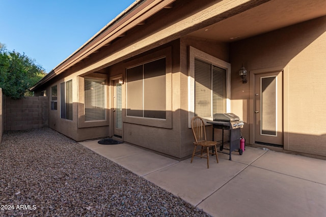 view of patio with a grill