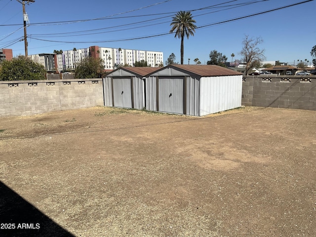 exterior space with a fenced backyard