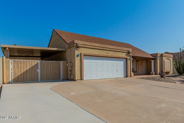 view of side of home with a garage