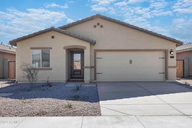 view of front of property featuring a garage