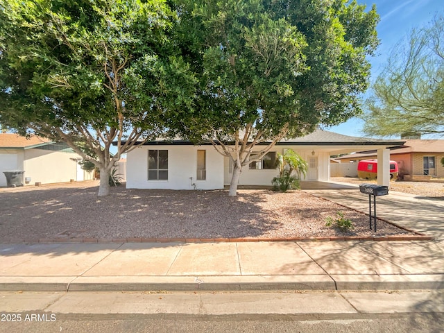 920 E Garnet Ave, Mesa, AZ 85204 - view of front of property featuring concrete driveway, a carport, and stucco siding