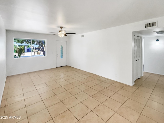 920 E Garnet Ave, Mesa, AZ 85204 - unfurnished room featuring ceiling fan and light tile patterned floors