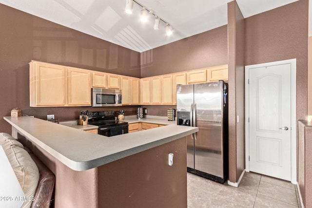 1350 S Greenfield Rd Unit 2205, Mesa, AZ 85206 - kitchen featuring appliances with stainless steel finishes, light brown cabinets, track lighting, light tile patterned flooring, and a high ceiling