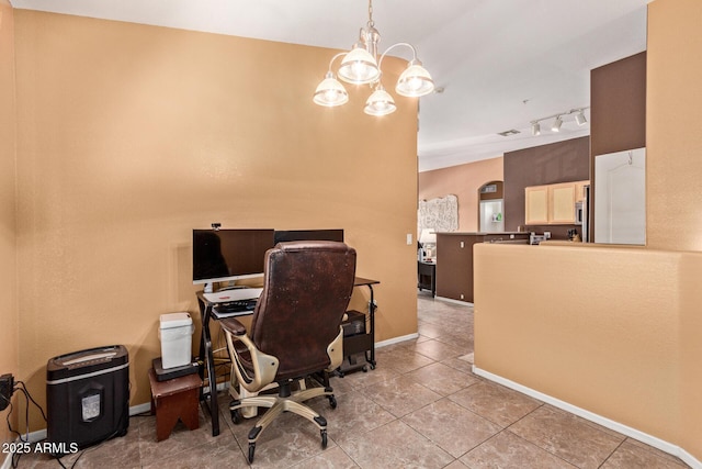 1350 S Greenfield Rd Unit 2205, Mesa, AZ 85206 - tiled office with a chandelier, track lighting, and baseboards