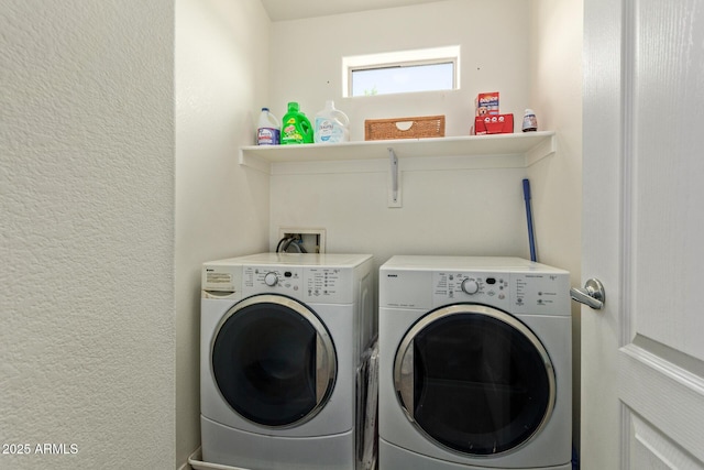 1350 S Greenfield Rd Unit 2205, Mesa, AZ 85206 - clothes washing area featuring washing machine and clothes dryer and a textured wall