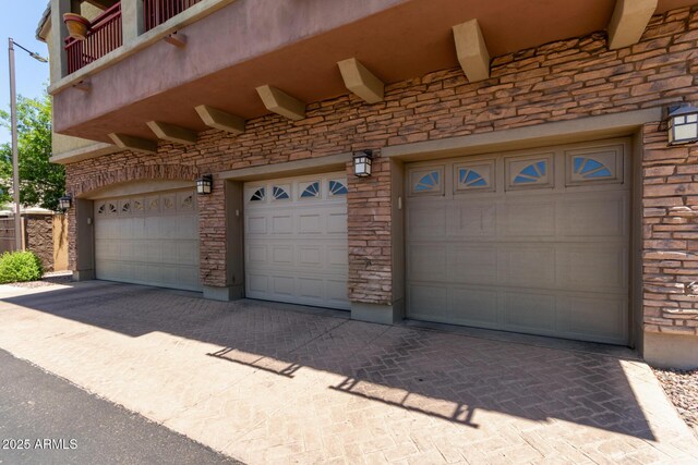 1350 S Greenfield Rd Unit 2205, Mesa, AZ 85206 - garage featuring driveway