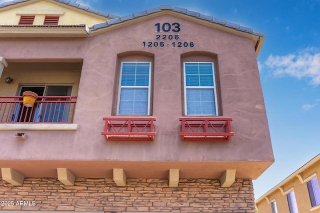 1350 S Greenfield Rd Unit 2205, Mesa, AZ 85206 - view of side of home with stucco siding