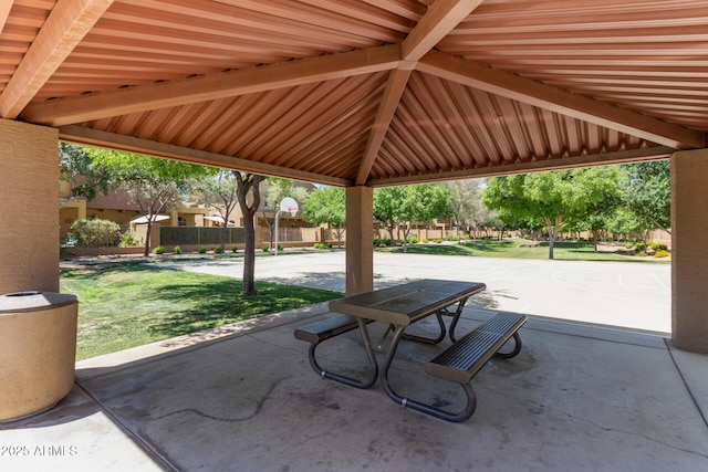 1350 S Greenfield Rd Unit 2205, Mesa, AZ 85206 - view of patio featuring community basketball court