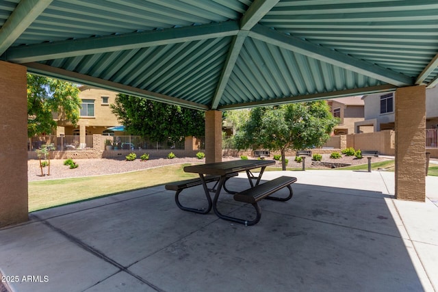 1350 S Greenfield Rd Unit 2205, Mesa, AZ 85206 - view of patio with fence and outdoor dining space