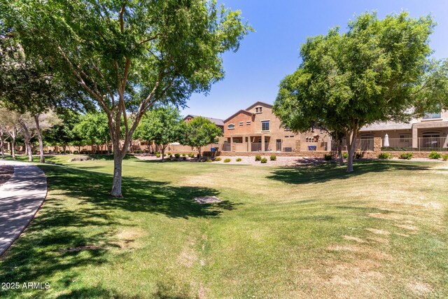 1350 S Greenfield Rd Unit 2205, Mesa, AZ 85206 - view of home's community featuring a yard