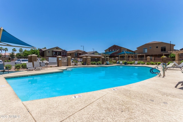 1350 S Greenfield Rd Unit 2205, Mesa, AZ 85206 - community pool with fence, a residential view, and a patio