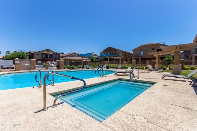 1350 S Greenfield Rd Unit 2205, Mesa, AZ 85206 - community pool featuring fence, a patio area, and a residential view