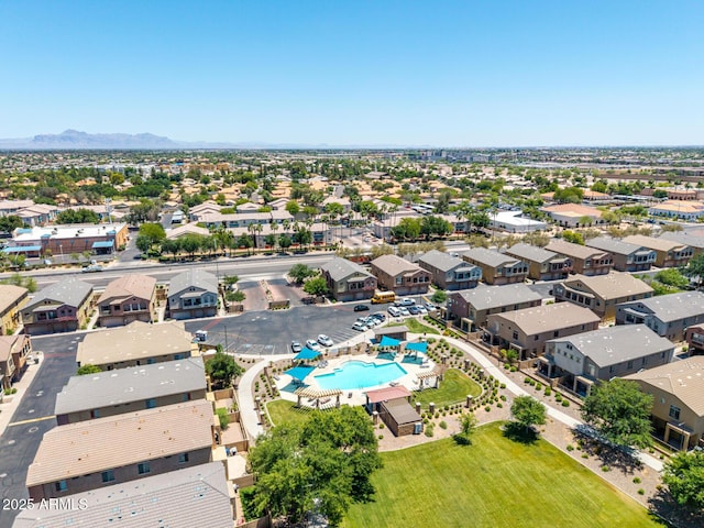 1350 S Greenfield Rd Unit 2205, Mesa, AZ 85206 - aerial view of residential area featuring a pool and a mountain backdrop