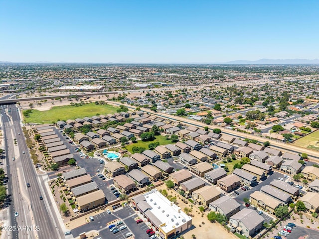 1350 S Greenfield Rd Unit 2205, Mesa, AZ 85206 - drone / aerial view of a major roadway and a mountain backdrop