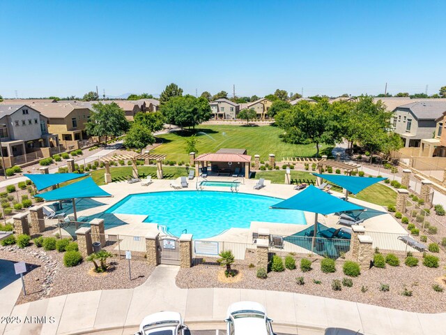 1350 S Greenfield Rd Unit 2205, Mesa, AZ 85206 - community pool featuring a gazebo, fence, a patio area, and a residential view