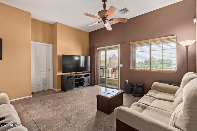 1350 S Greenfield Rd Unit 2205, Mesa, AZ 85206 - tiled living room with ceiling fan and baseboards