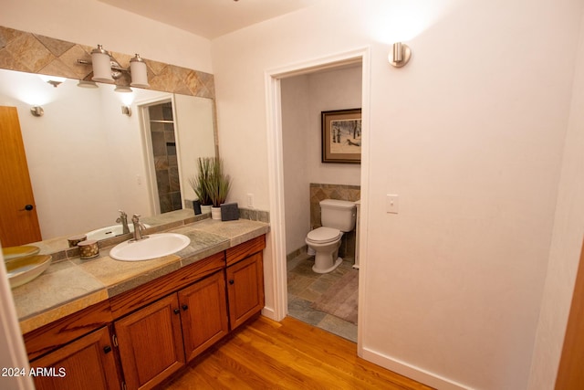 5120 N Juniper Loop, Pine, AZ 85544 - bathroom featuring toilet, vanity, and wood finished floors