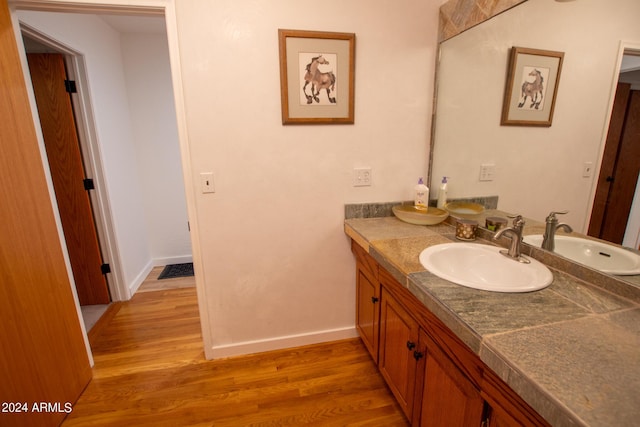 5120 N Juniper Loop, Pine, AZ 85544 - bathroom featuring vanity, baseboards, and wood finished floors