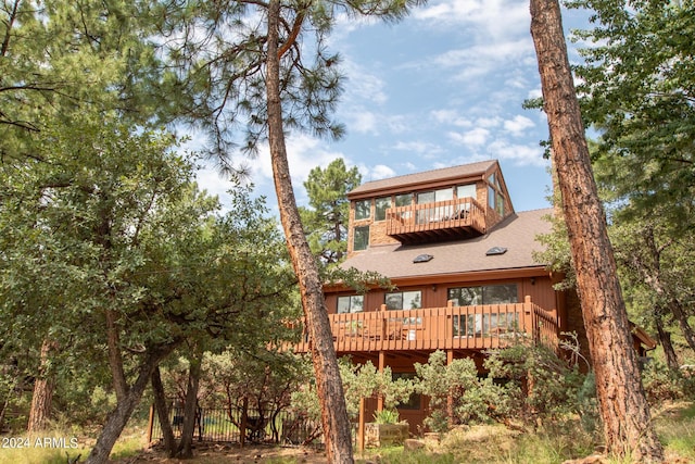 5120 N Juniper Loop, Pine, AZ 85544 - back of property with a wooden deck, a shingled roof, fence, and a balcony