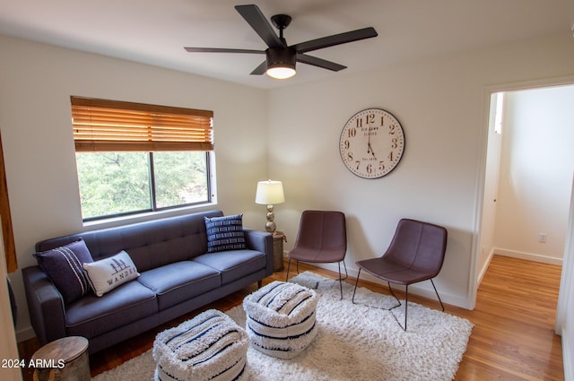 5120 N Juniper Loop, Pine, AZ 85544 - living room featuring baseboards, a ceiling fan, and wood finished floors