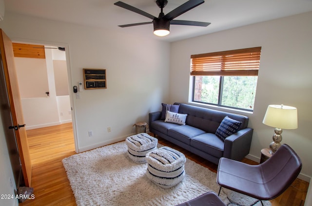 5120 N Juniper Loop, Pine, AZ 85544 - living area featuring wood finished floors, baseboards, and ceiling fan