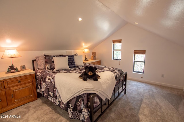 5120 N Juniper Loop, Pine, AZ 85544 - bedroom with lofted ceiling, light carpet, and baseboards