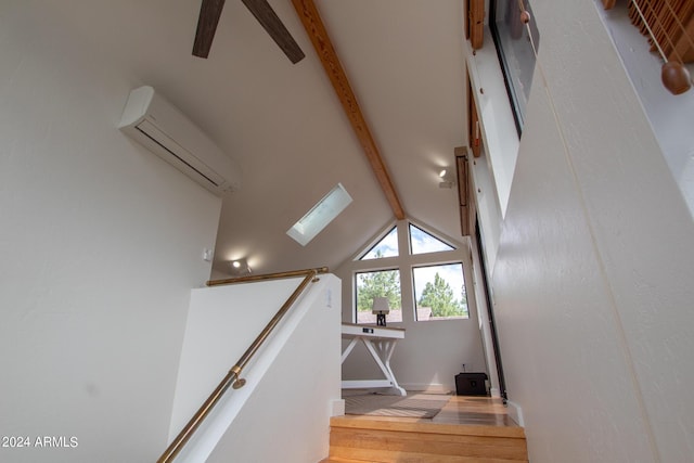 5120 N Juniper Loop, Pine, AZ 85544 - staircase with a wall mounted air conditioner, lofted ceiling with beams, and wood finished floors