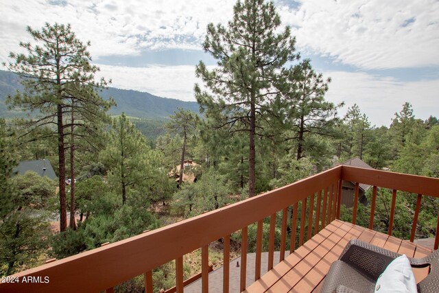 5120 N Juniper Loop, Pine, AZ 85544 - wooden terrace featuring a mountain view and a view of trees