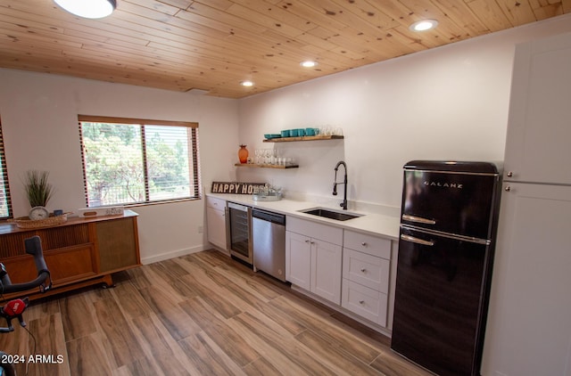 5120 N Juniper Loop, Pine, AZ 85544 - kitchen featuring freestanding refrigerator, wine cooler, dishwasher, wood ceiling, and a sink