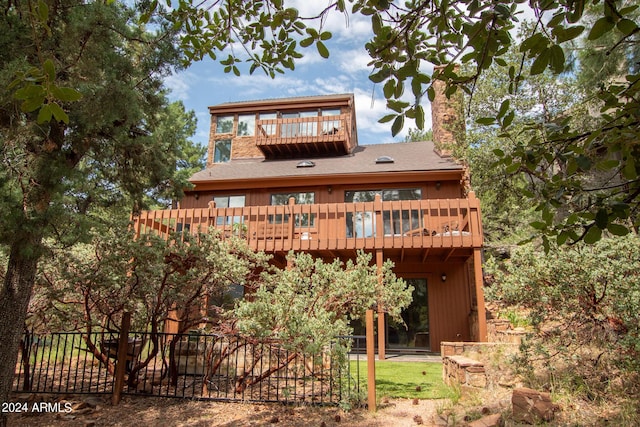5120 N Juniper Loop, Pine, AZ 85544 - back of house featuring a balcony and fence
