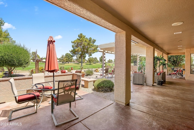 view of patio featuring a pergola