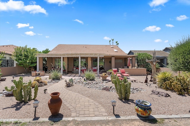 ranch-style home with a patio area