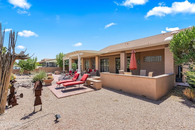 back of house featuring a patio