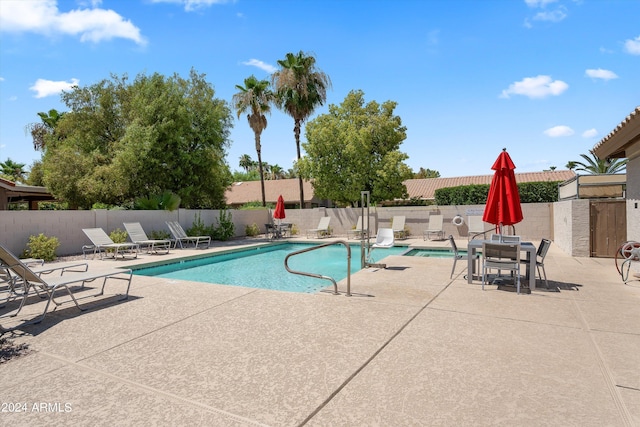 view of pool featuring a patio