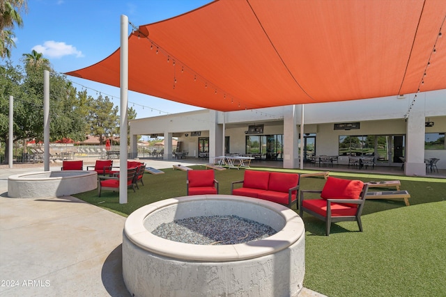 view of patio / terrace featuring a fire pit