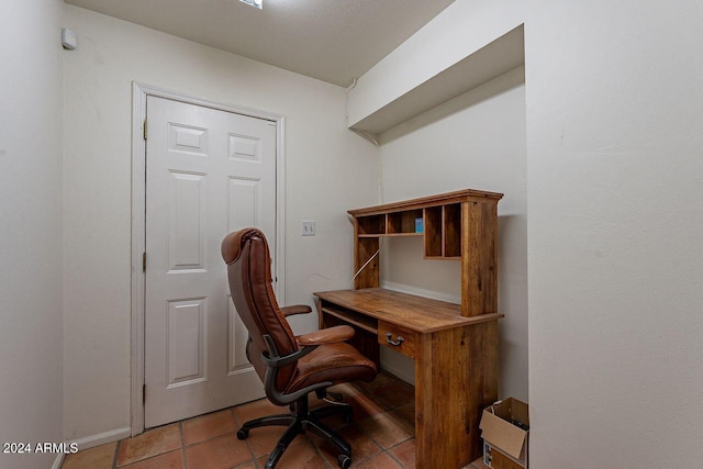 office space with light tile patterned floors