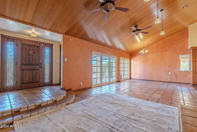 tiled entrance foyer with ceiling fan with notable chandelier, vaulted ceiling, and wooden ceiling