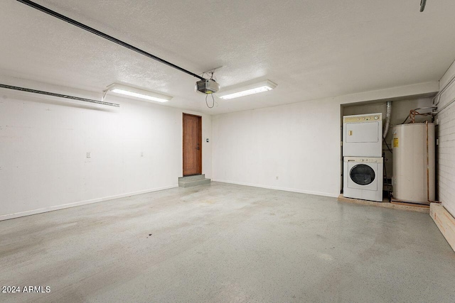 garage with water heater, stacked washer and clothes dryer, and a garage door opener