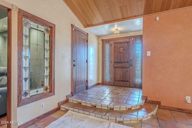 foyer featuring lofted ceiling and wooden ceiling