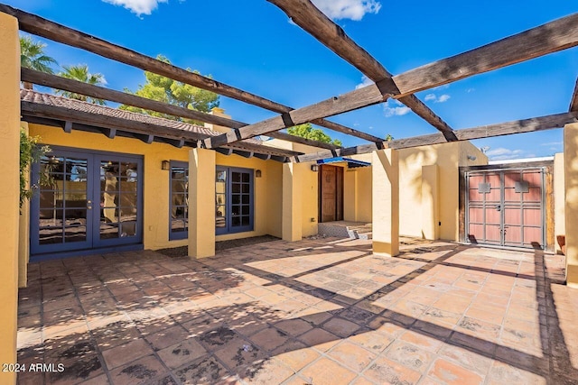 view of patio with a pergola and french doors