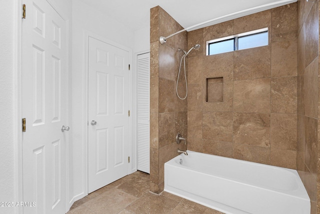 bathroom with washtub / shower combination