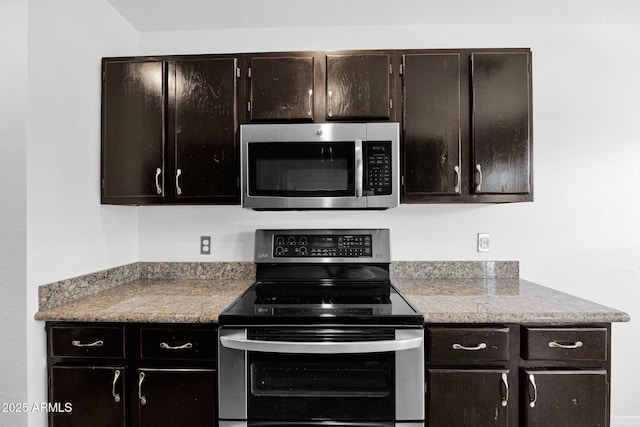 kitchen featuring light countertops and stainless steel appliances