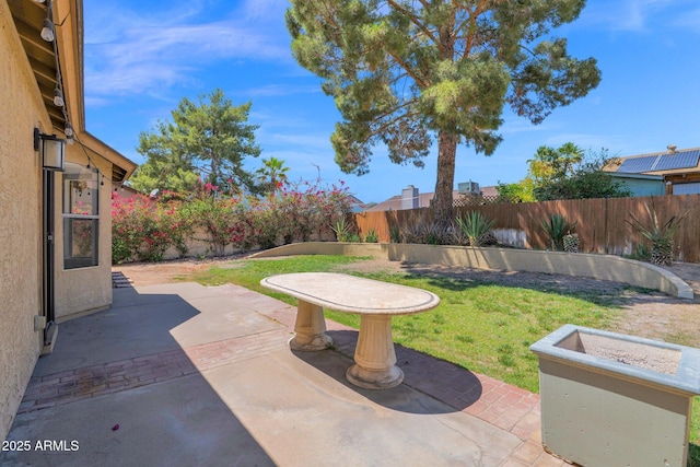 view of patio with a fenced backyard