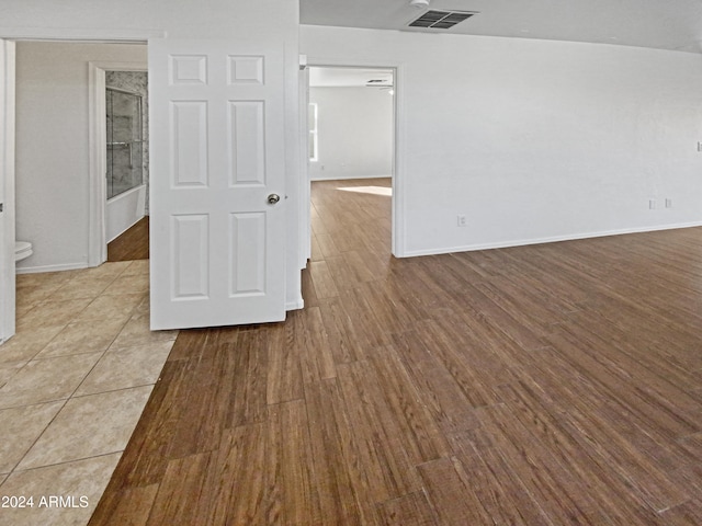 unfurnished room featuring light hardwood / wood-style floors