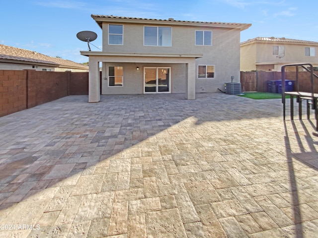 back of house featuring a patio and central AC