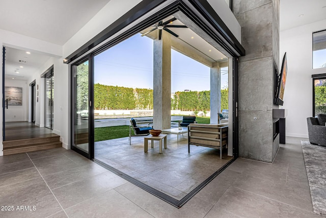 doorway featuring a towering ceiling